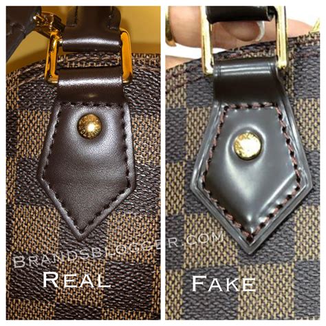 louis vuitton alma bag real vs fake|false louis vuitton alma bags.